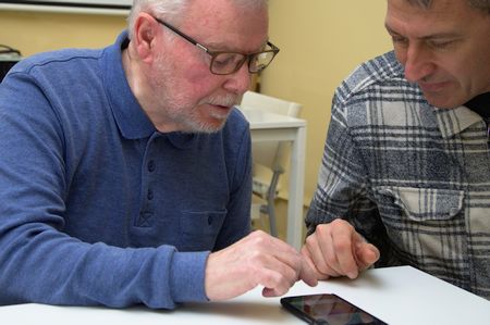 end user and facilitator taking part on a usability test