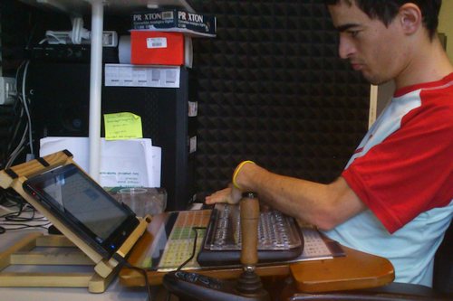 ruben using windows tablet with a keyguard