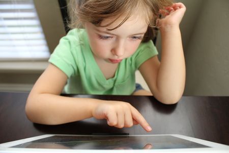 young girl using a tablet